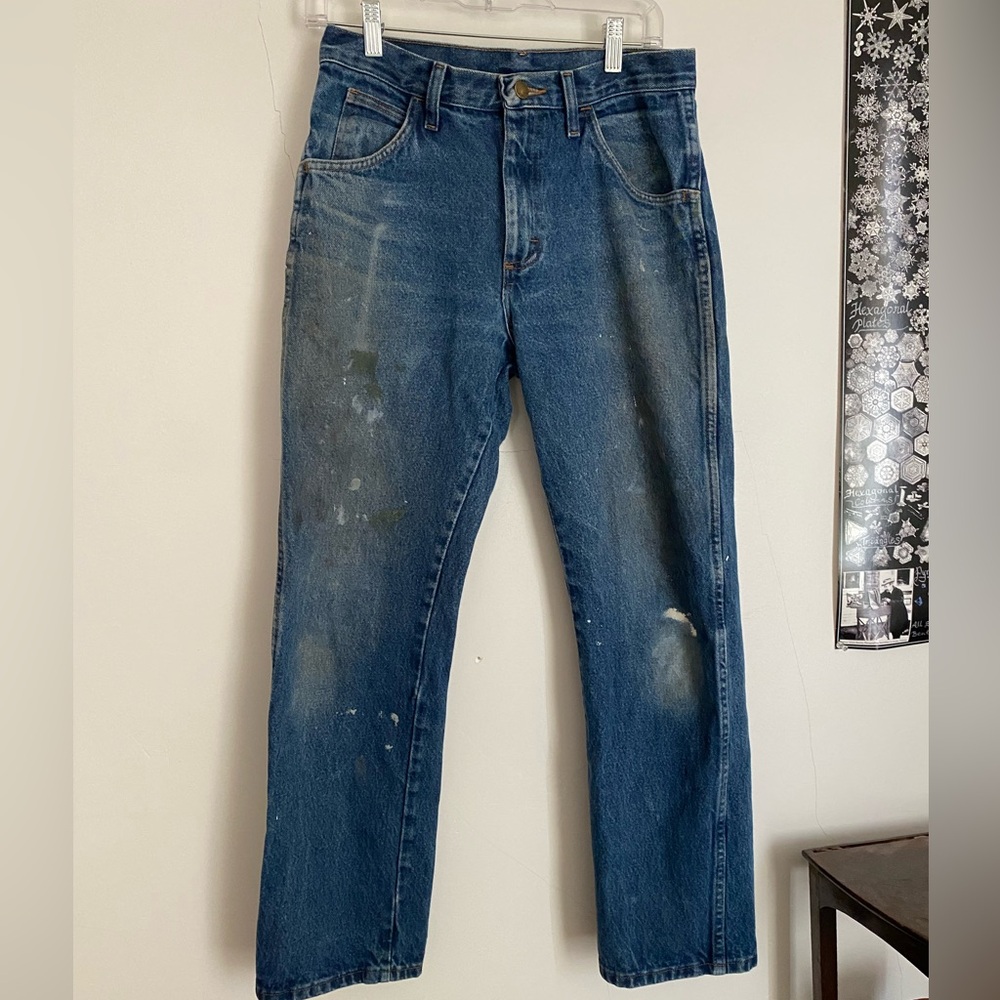 Distressed legendary gold wrangler jeans
